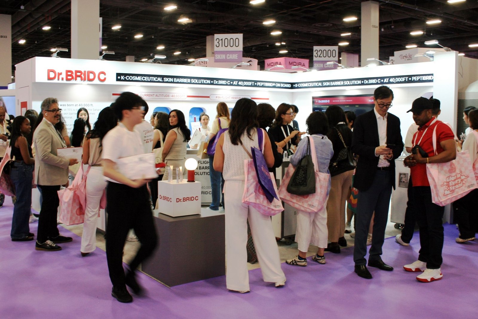 Visitors crowding the aisle in front of a skincare stand at Cosmoprof North America in Las Vegas